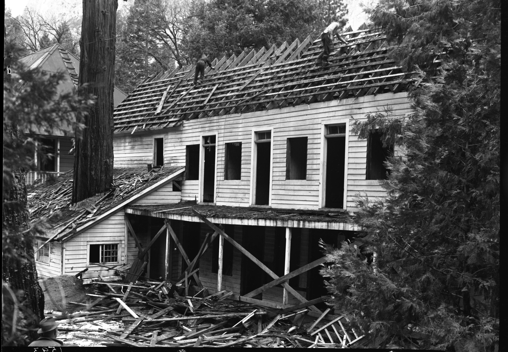 Rear view of Cedar Cottage during demolition.