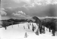 Half Dome from Mt. Watkins in late p.m. with clouds.