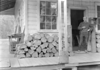 Old Kenny house with the "Birdman" [The "Birdman" was Bert Sonn].