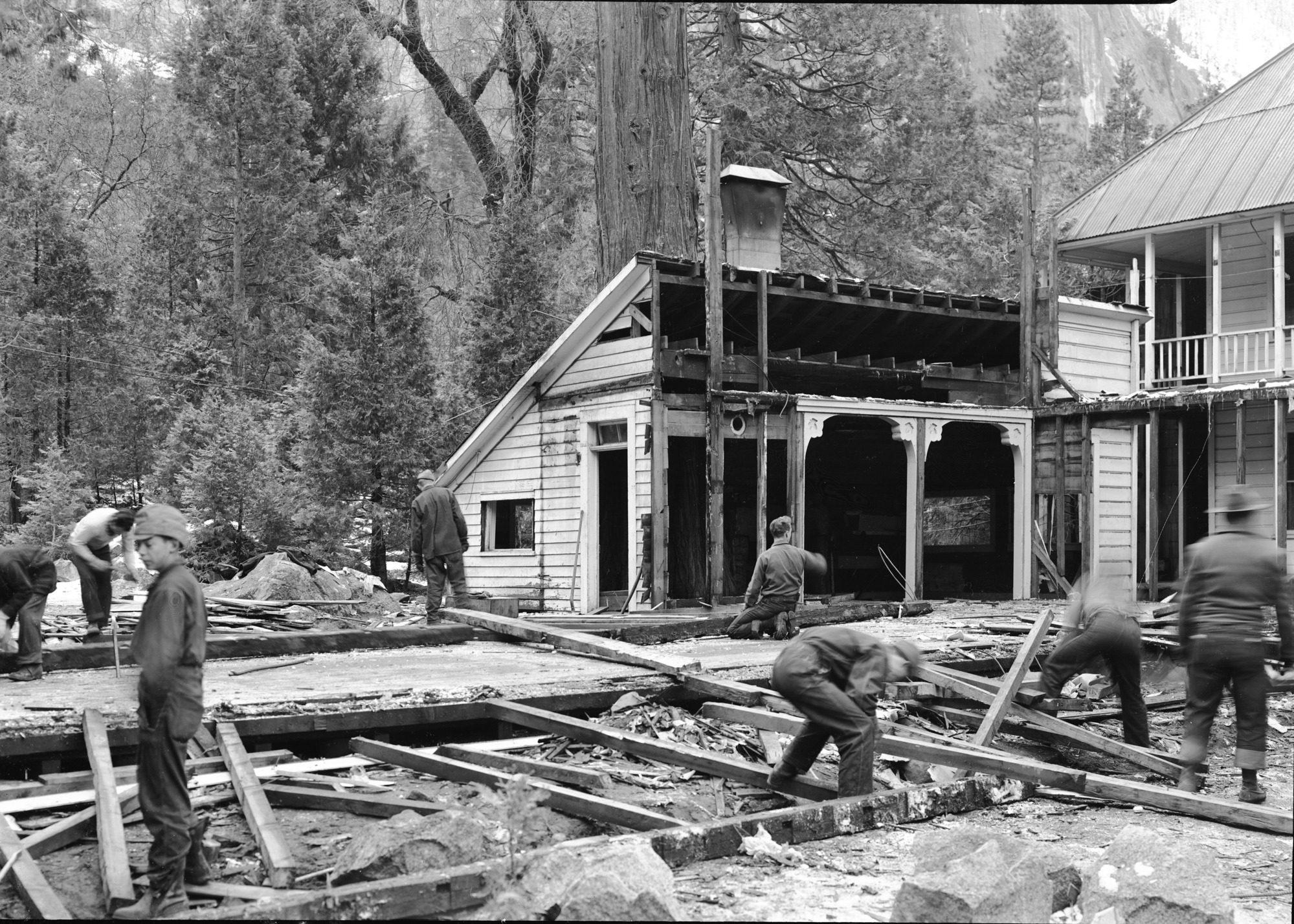 Tearing down Cedar Cottage.