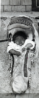 Copy Neg: July, 1981 by Michael Dixon. Unidentified child in Paiute cradle - probably Yosemite Valley. From S. Sargent collection.
