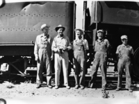 Last freight haul. Left to rt. Rob't [Jirsa] Luggins - Brakeman; Guy Clmts - conductor; Shoup - Engineer; Melvin Wms - Fireman