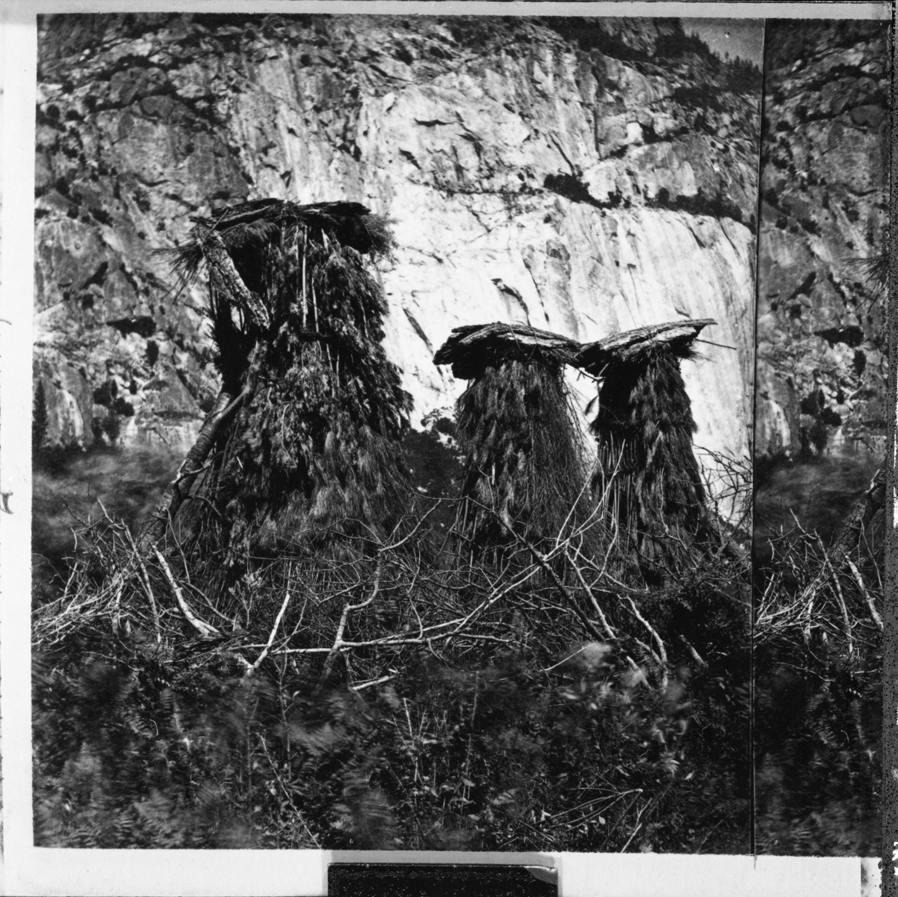 Acorn granaries, "chuck-ah", Yosemite Valley. Copied from an 1868 or 1872 stereograph.