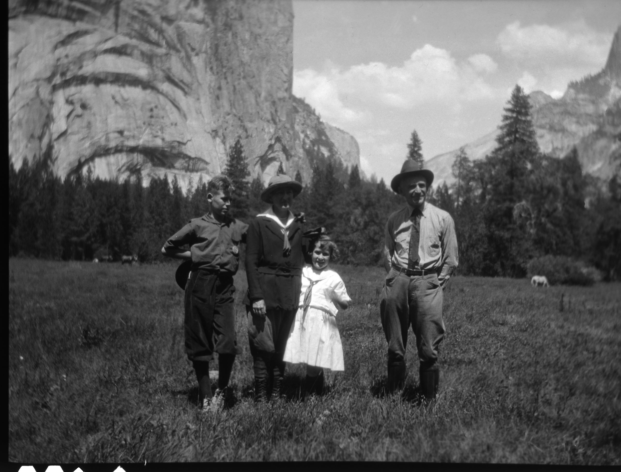 Yosemite Valley L to R: Warren (Jean's brother); Alice Jean (Jean's mother); Jean Coolbaugh and Allan Bevans (seasonal ranger- Jean's uncle). Copied courtesy of Mrs. Jean Coolbaugh Blasdale. Copied September 1983, by Michael Dixon