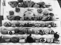 Sales photo of baskets at Salter's store, Yosemite. #6 & 10 by Lucy Telles, now at Field Museum of Natural History, Chicago. #25, 29, 35 also by Lucy Telles. #25 in YNP Collection.