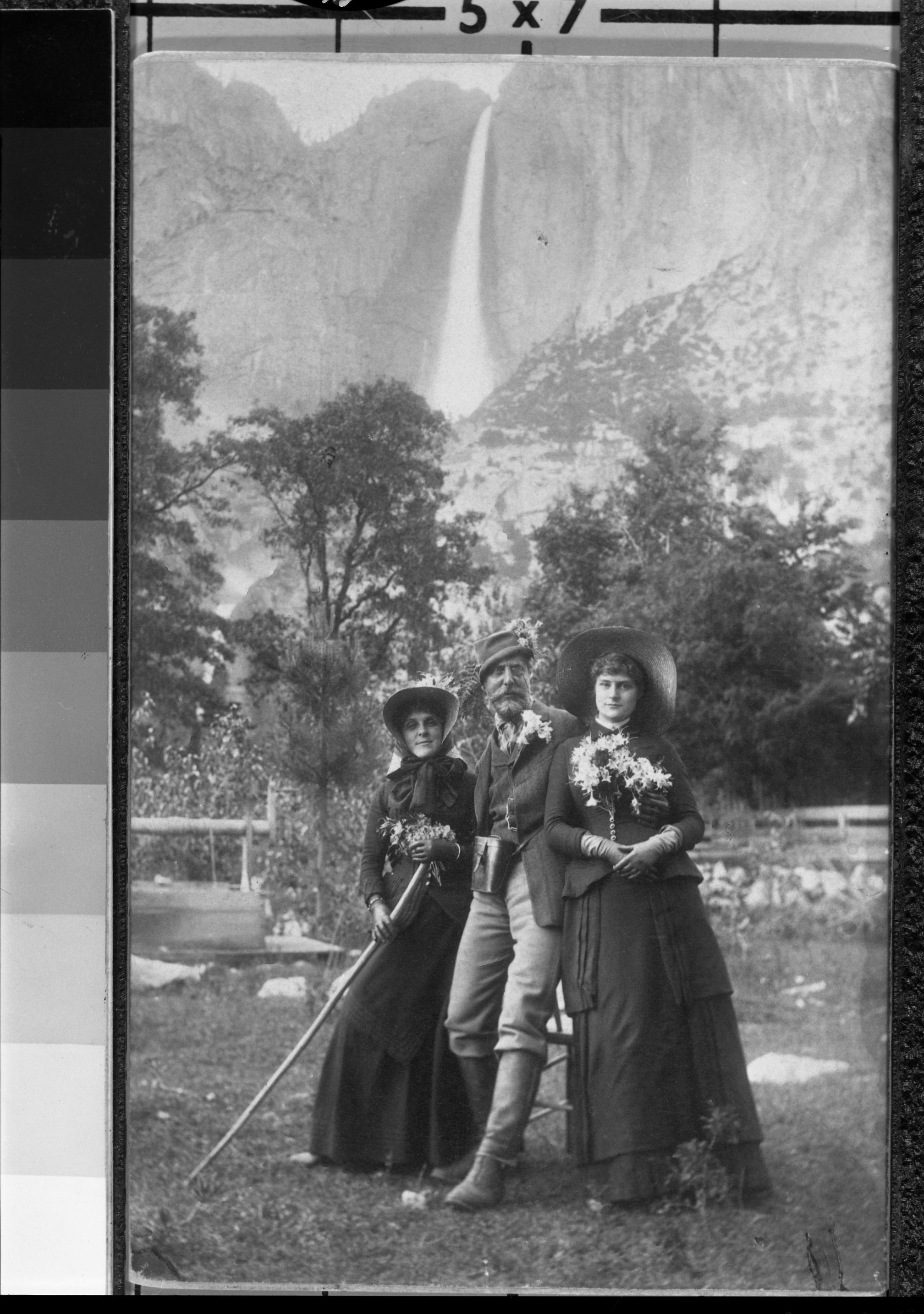 Group portrait in front of Yosemite Falls. YM #28,669. See also Plate 64 (p. 72) of Ted Orland's "Man and Yosemite". Copied Han. 1982 by Michael Dixon.