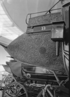 Detail of original stagecoach (hand-tooled leather) in the Junipero Serra Museum.