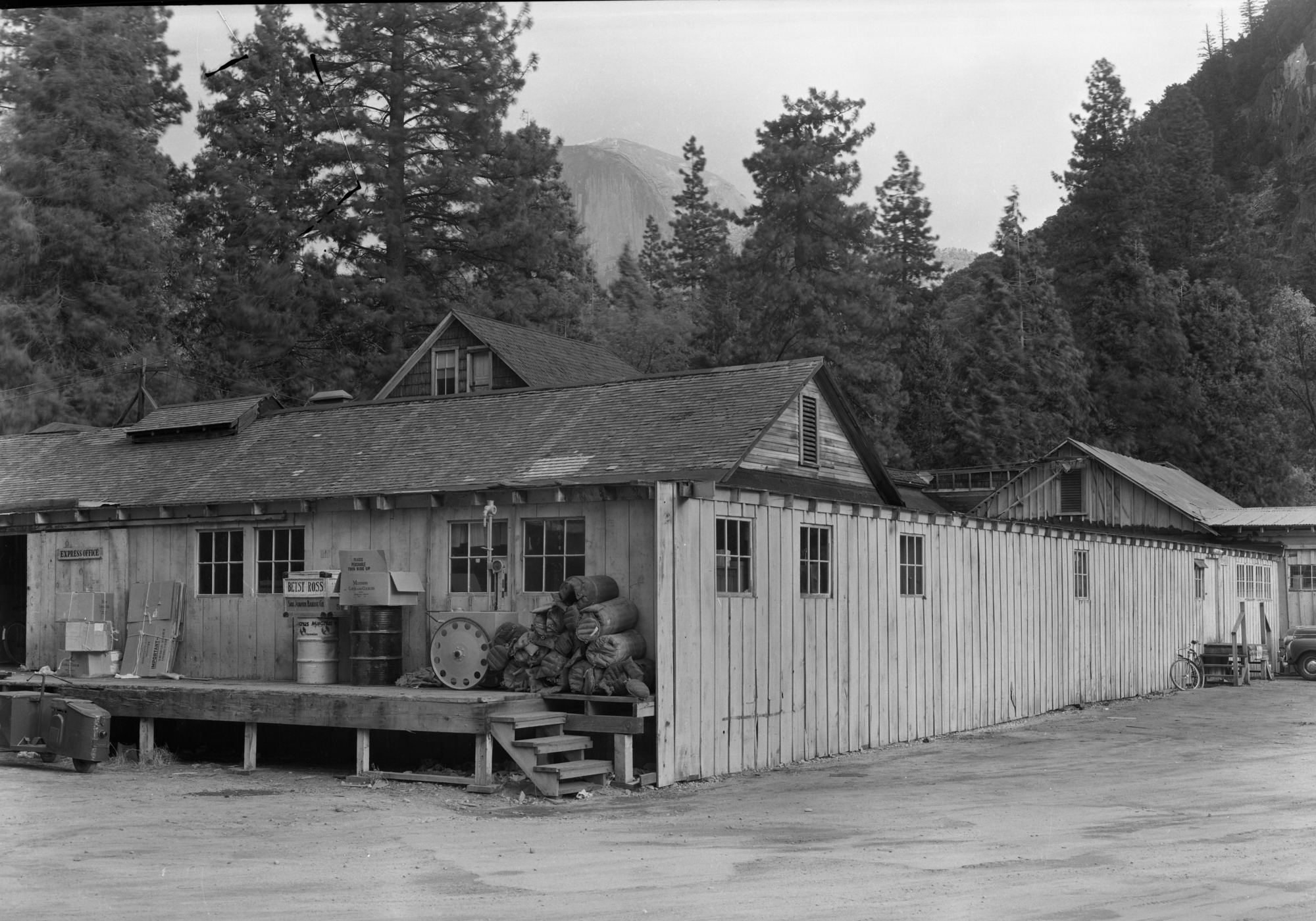 Ramshackled buildings in Co. warehouse area. Yos. RL Seps. 979.447 Y-16c #31.