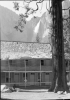 Cedar Cottage from rear showing Yosemite Falls.