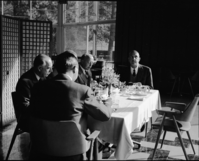 King Umberto & Party of Italy, in the Village Restaurant. Photo taken from end of table over shoulder of Mr. Hutchinson and facing King Umberto. Man on left: Count Raimondo Olivieri and Marchese Falcone Lucifero and His Majesty King Umberto di Savoia.