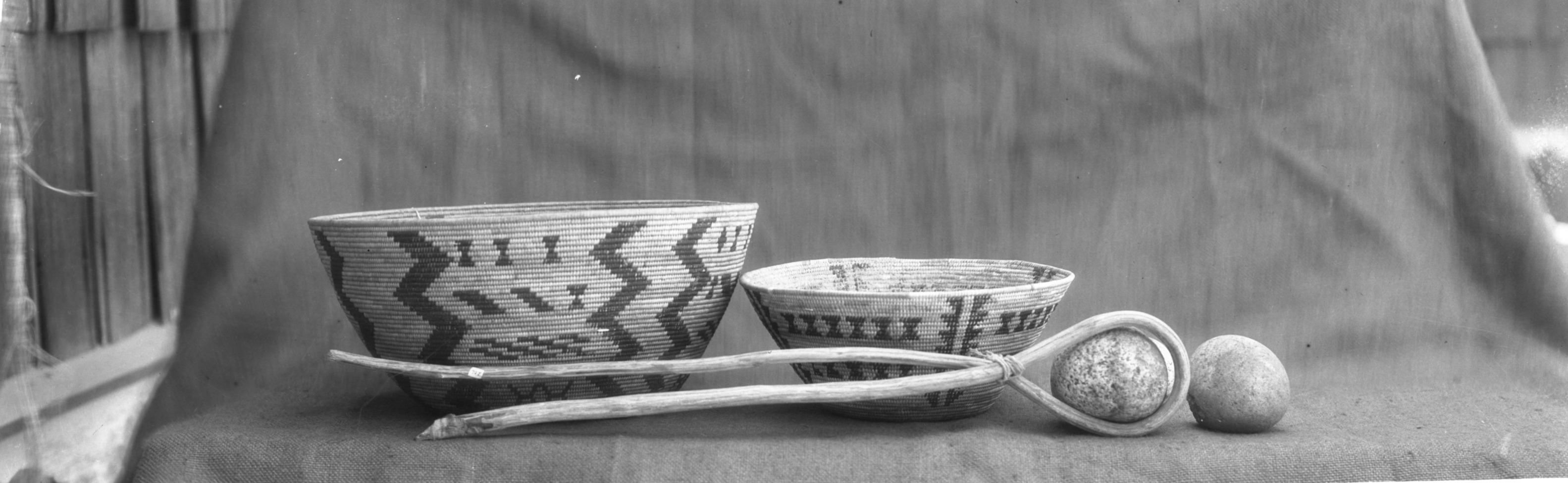 Cooking baskets and stones. Baskets in the YNP Collection. The far left basket is Cat. #133.
