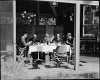 King Umberto & Party of Italy, in the Village Restaurant. Looking at the side of the dining table: Left to right: Mr. Wm. N.L. Hutchinson, Jr.; Count Raimondo Olivieri; the Duke of Morignano, Don Eugenio Ruspoli; Marchese Falcone Lucifero; and His Majesty King Umberto di Savoia.