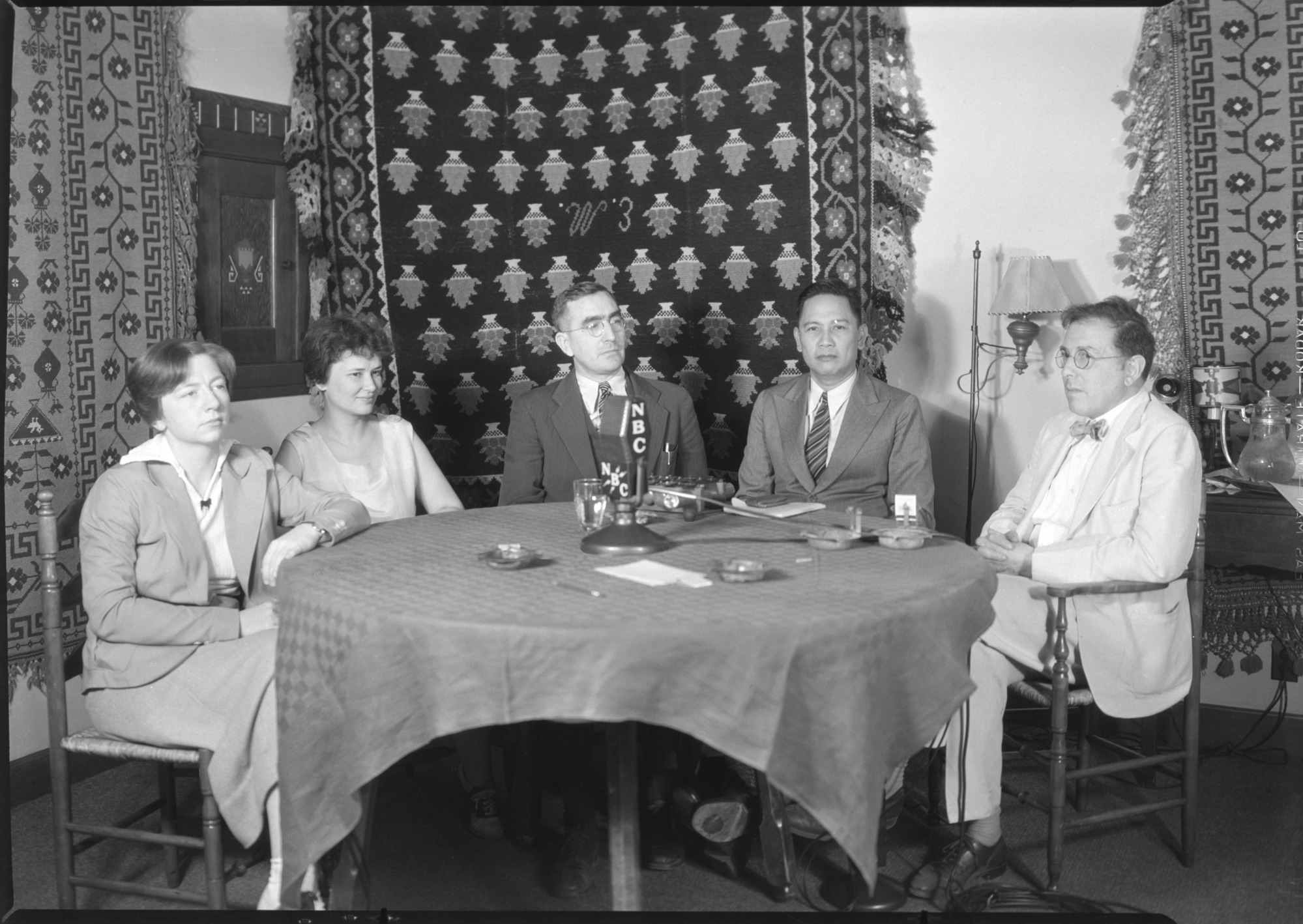 Institute of Pacific Relations. L-R: Miss Miriam Farley, conference recorder; Miss Eloise G. Requa, conference recorder; Conrado Benitez, Chairman of the Phillipine delegation; Bruno Lasker, Director of the IPR broadcasts