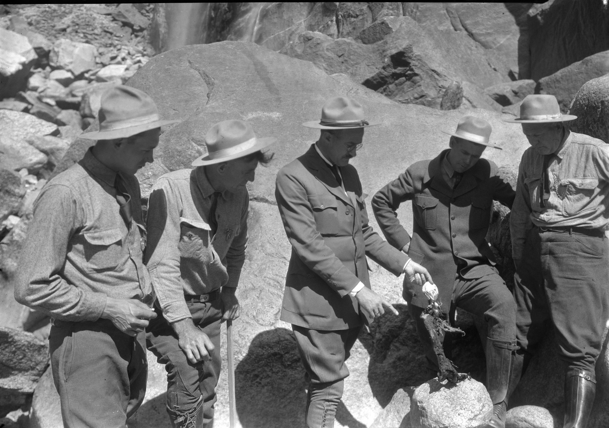 Examining the remains of man that jumped over Yosemite Falls. L-R: Holbrook, Wegner, Church, Boothe & Skelton