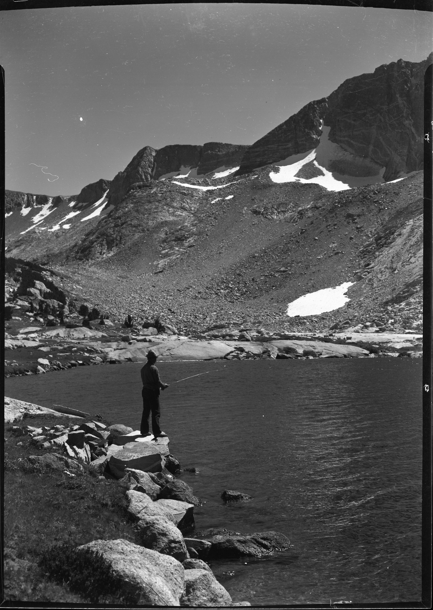 Frank Taylor fishing high country lake.