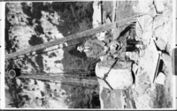 Hall standing by cornerstone. YNP Collection, Cat. #9869