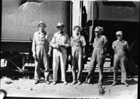 Last freight haul. Left to rt. Rob't [Jirsa] Luggins - Brakeman; Guy Clmts - conductor; Shoup - Engineer; Melvin Wms - Fireman