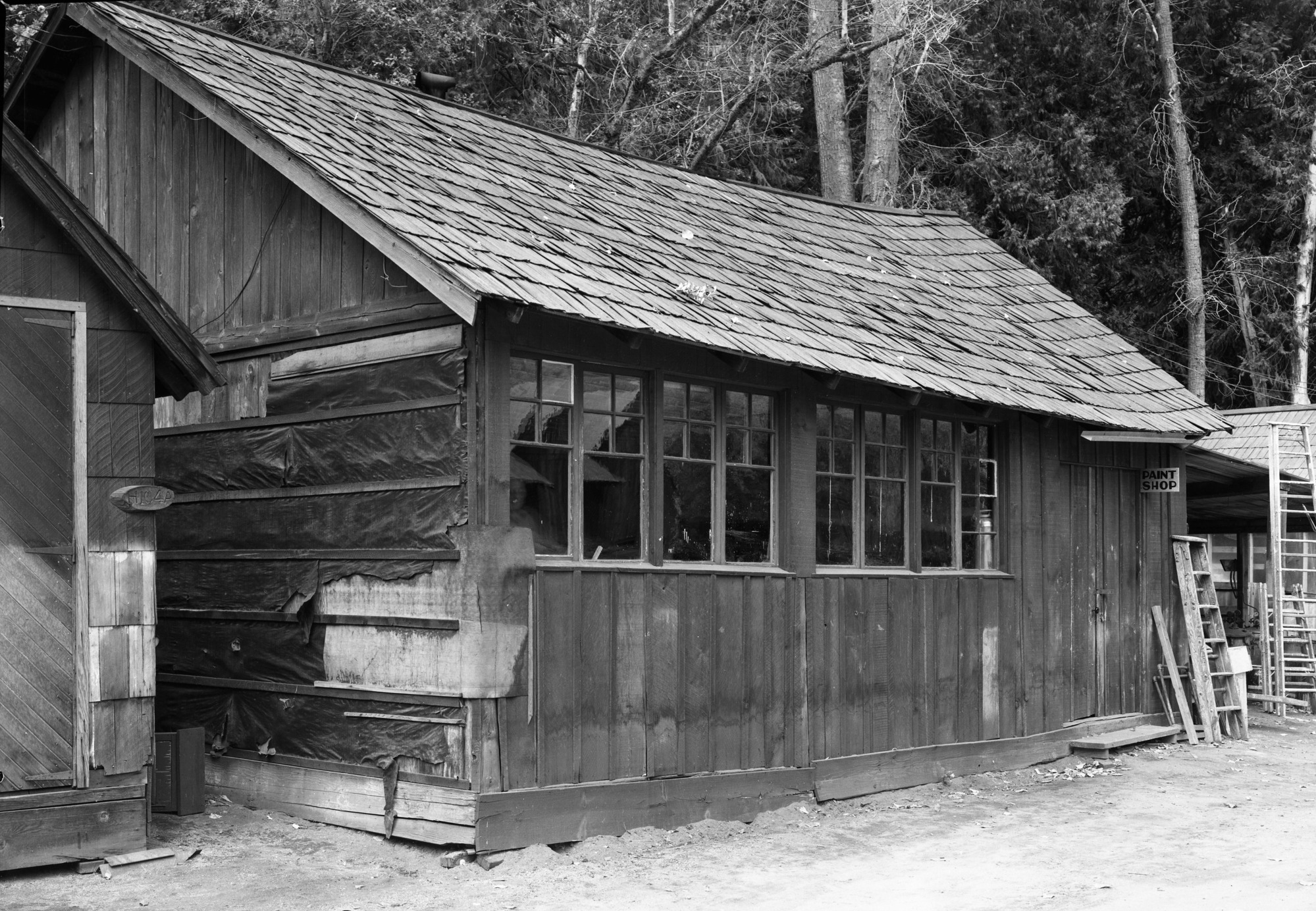 Ramshackled buildings in Co. warehouse area. Yos. RL Seps. 979.447 Y-16c #31.