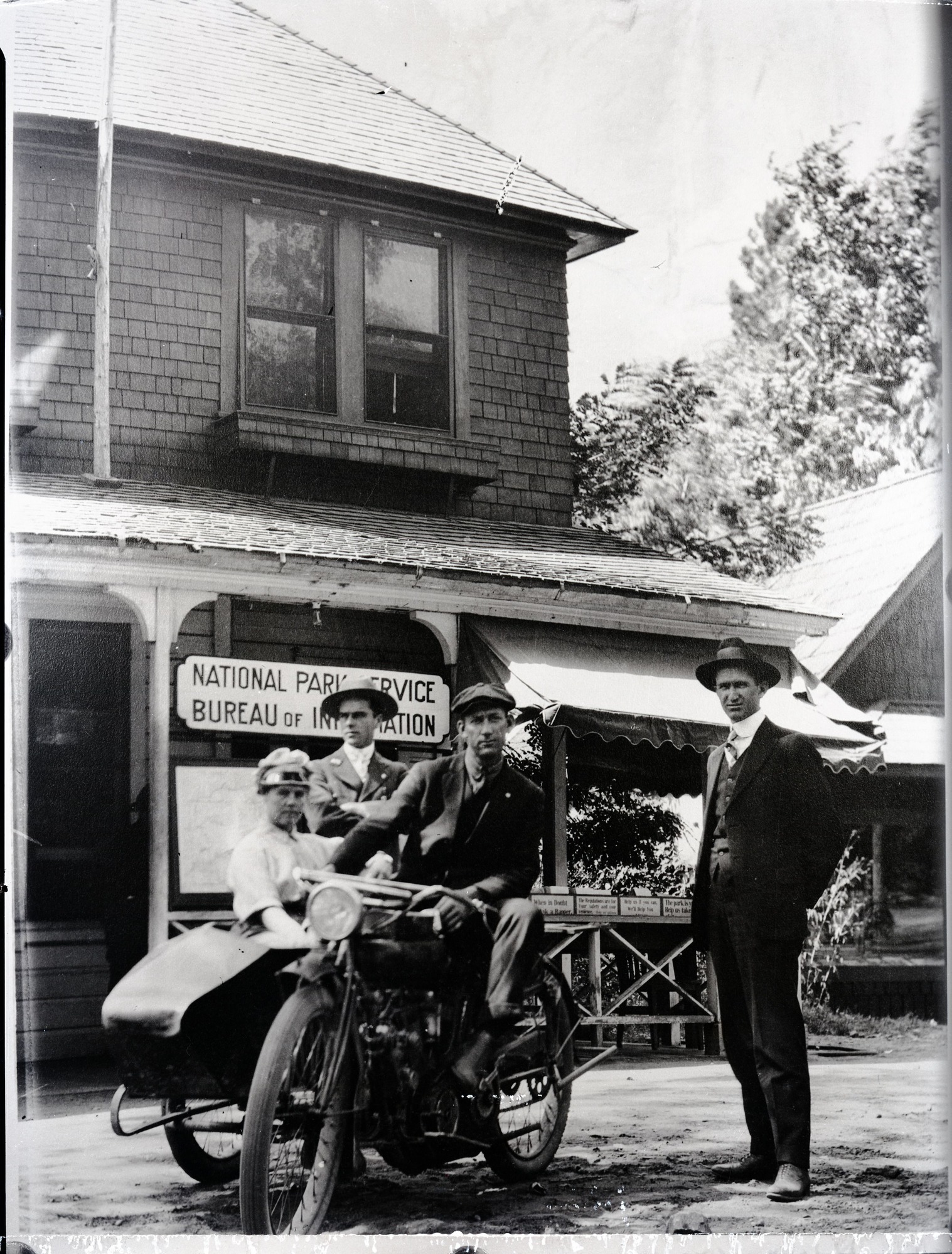 Supt. Lewis in the background. Horace Albright on the right. copied by Phillips