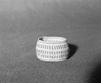 Marie Rozier Collection, Catalog No. 161. Object: Wintu? Dimensions: 4 x 2 1/2". Materials: Conifer root, beargrass, maidenhair fern stem. Technology: Up to right slant of turns; three-strand twined bottom; one row of lattice twining at base; start is indented. Collection History: Gift of Ora Doyle. Photographed by Michael Dixon in December 1982. Catalogued by Craig Bates and Barbara Beroza. Yosemite Collections, National Park Service.