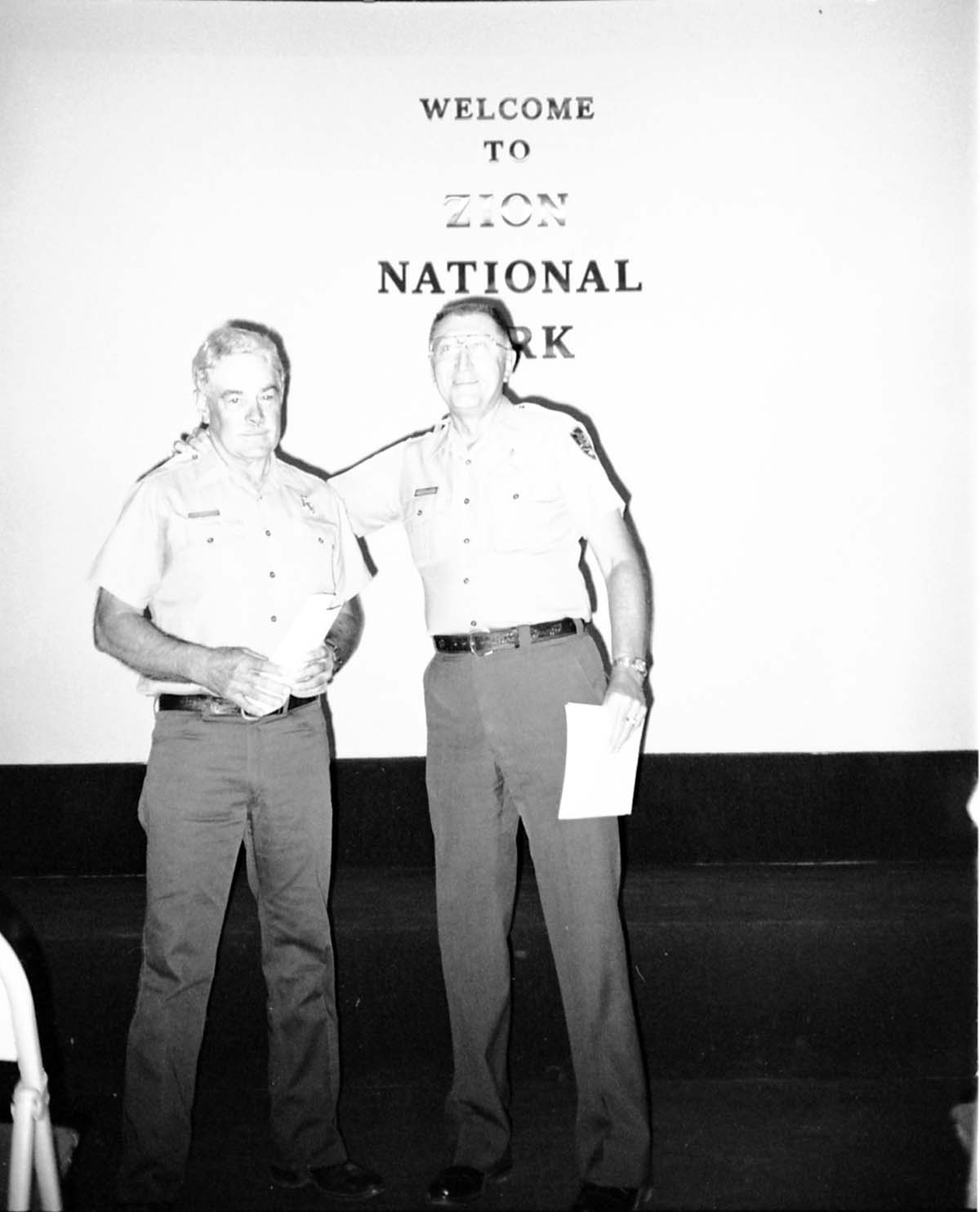 BW Photos of Superintendent Harold Grafe giving out awards to park personnel.