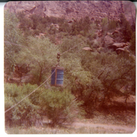 Construction equipment for Wiley Tank being transported on tramline.
