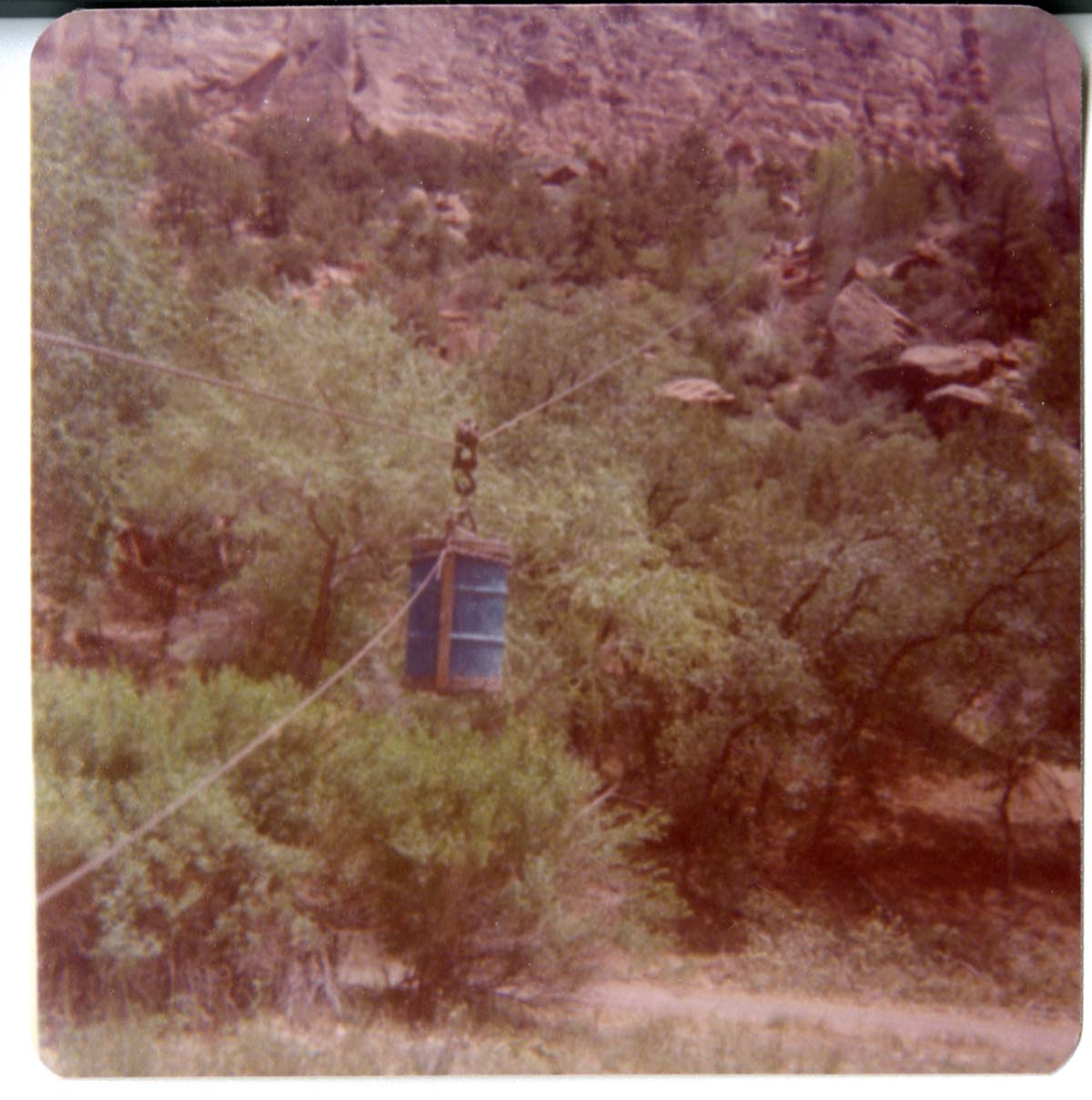 Construction equipment for Wiley Tank being transported on tramline.