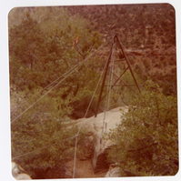Construction equipment for Wiley Tank being transported on tramline.