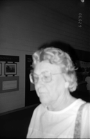 Close up of a woman walking through the old Mission 66 Visitor Center and Museum.