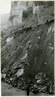 Workers engaged in bank stabilization above the Zion Mt Carmel Highway.