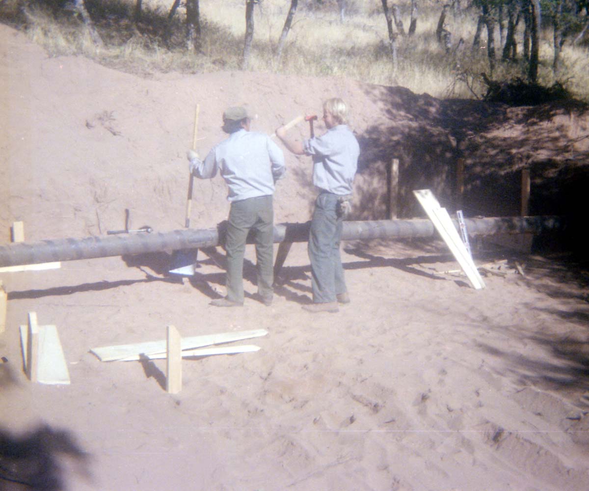 Workers during the construction of the Wiley Spring water pipeline.