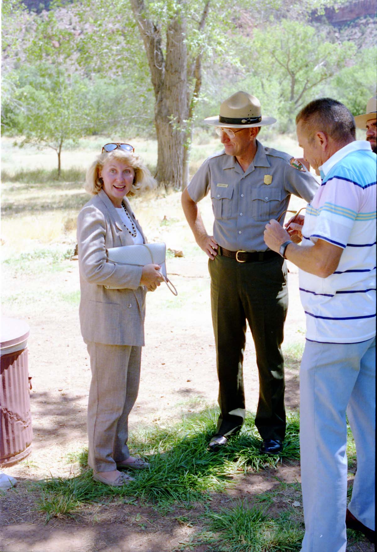Color Photos of the parks 72nd anniversary celebrations- cake cutting, barbecue, speakers.