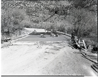 Oak Creek Bridge Construction troweling concrete bed.