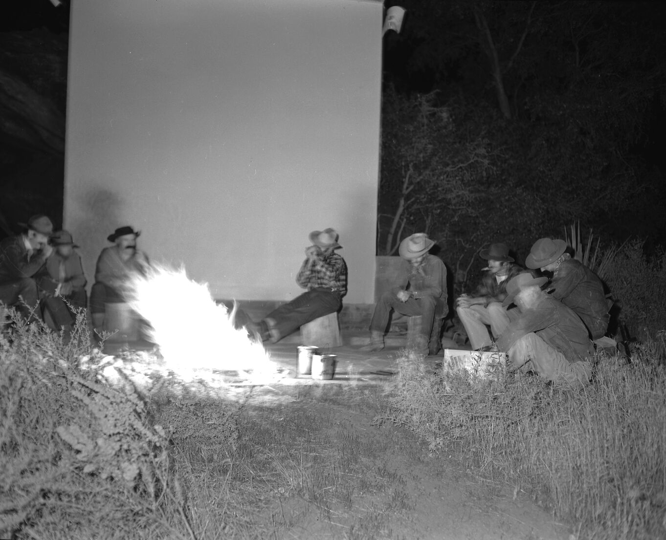Staff in pioneer costumes performing during campfire program. Campfire Day, September 19, 1957 at the South Campground amphitheater.