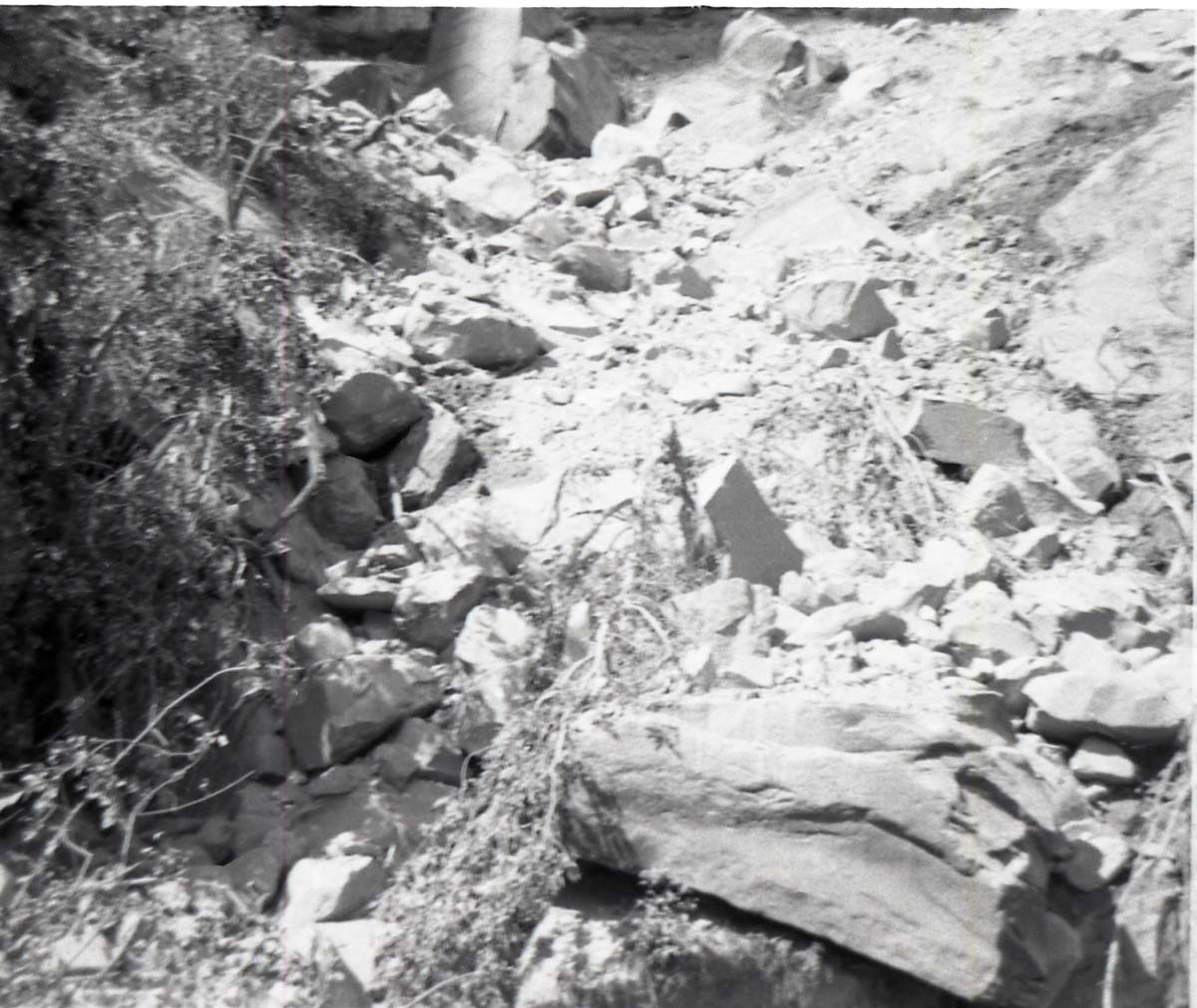 Rubble pile at base of canyon wall after rock slide. Birch Creek.