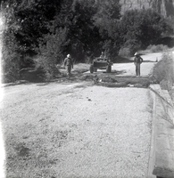 Men repairing section of the road along the scenic canyon drive near the Grotto.
