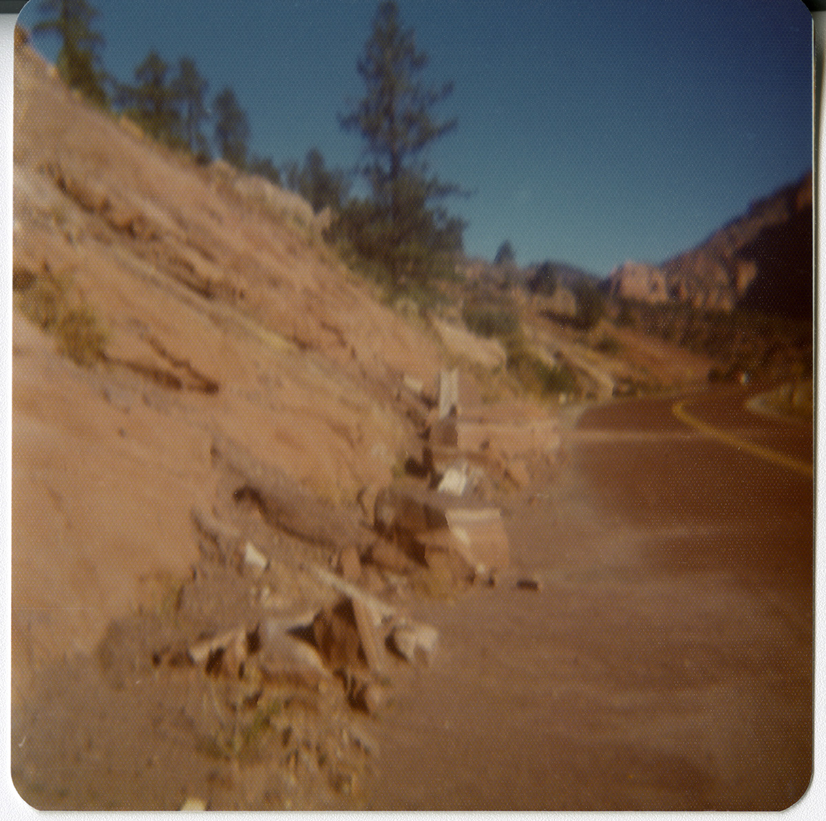Rock piles on side of road during road repair of Kolob Canyon Road.