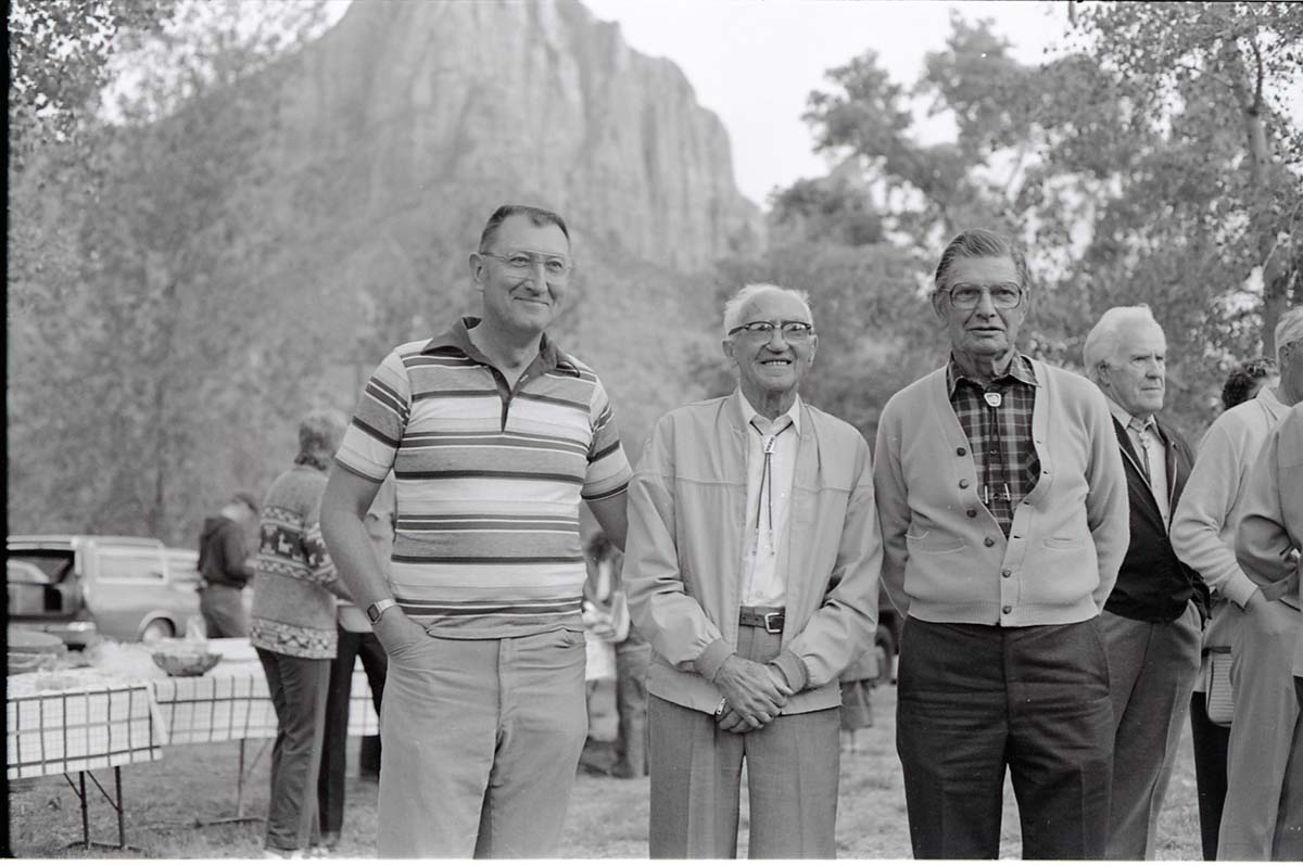 BW Photos of the Crocker/ Nicholson retirement barbeque. Superintendent Harold Grafe in striped shirt.