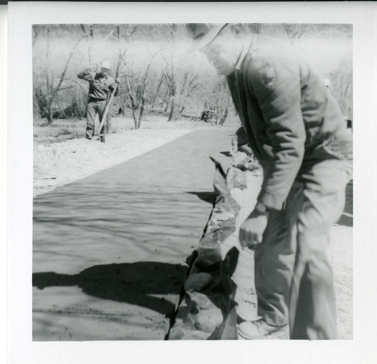 Workers during the Lady Mountain sign emplacement.