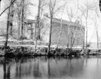 Southwest sides of Winsor Castle fort and pond at Pipe Spring.