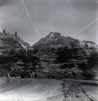 Men working on road repair and turn out construction on the East side.