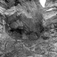 42WS0069. Indian cave in Cave Valley for documenting pot hunter activities and vandalism.