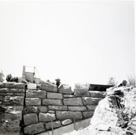 Brick retaining wall along East Rim road during repairs.