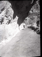 Reconstructed and paved section of West Rim Trail in 'half tunnel' section just below mouth of Refrigerator Canyon.