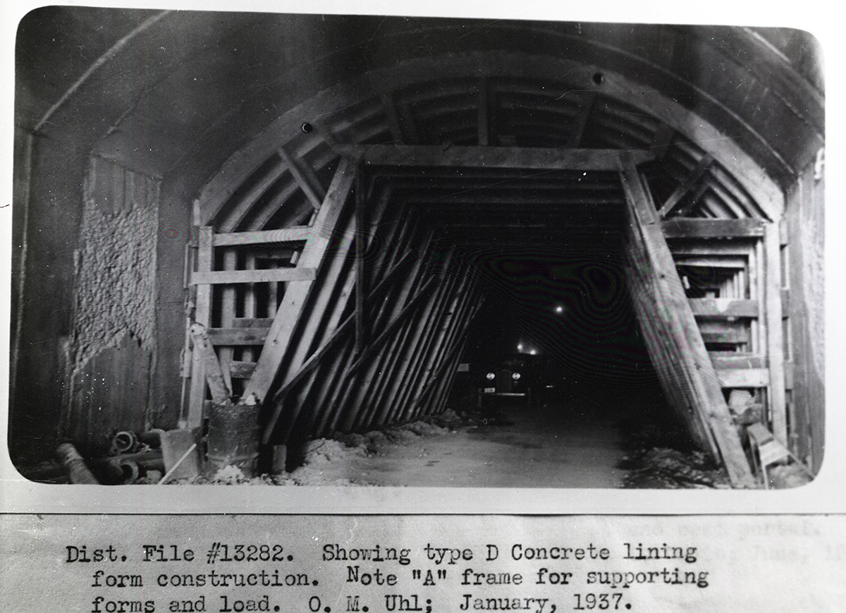 Type D lining form construction. A frame for supporting forms and load in long tunnel, supplemental construction - Zion Mt Carmel Highway.