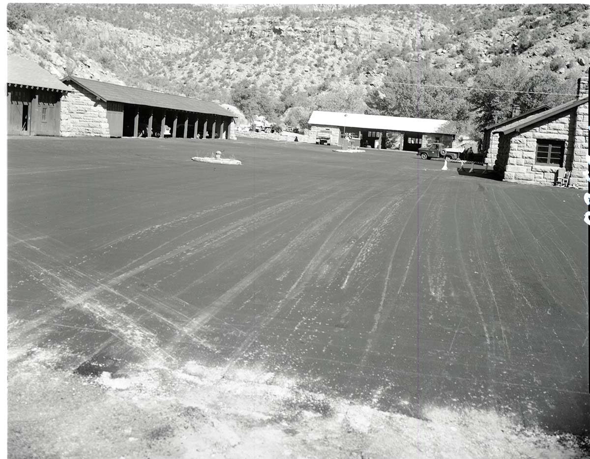 Completed repair and paving of utility area road.