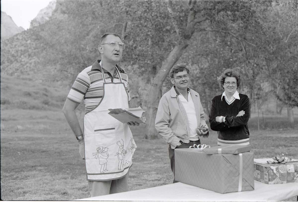 BW Photos of the Crocker/ Nicholson retirement barbeque. Superintendent Harold Grafe in apron speaking.