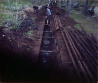 Workers uncovering the irrigation ditch in South Campground.