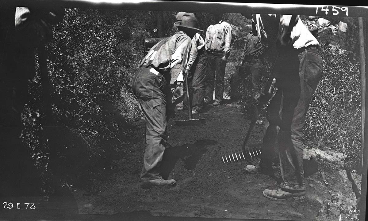 West Rim Trail construction. Experimental paving of the trail using a mix of bitumuls 60 with oiled sand.
