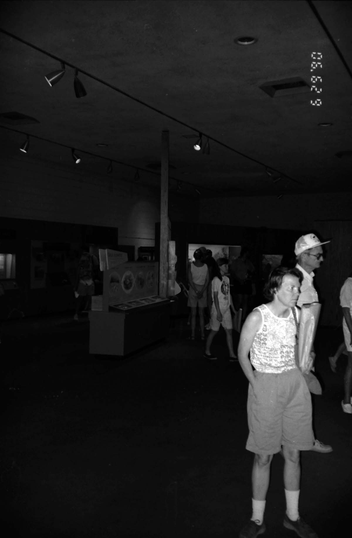 Visitors viewing the interpretive display in the old Mission 66 Visitor Center and Museum.